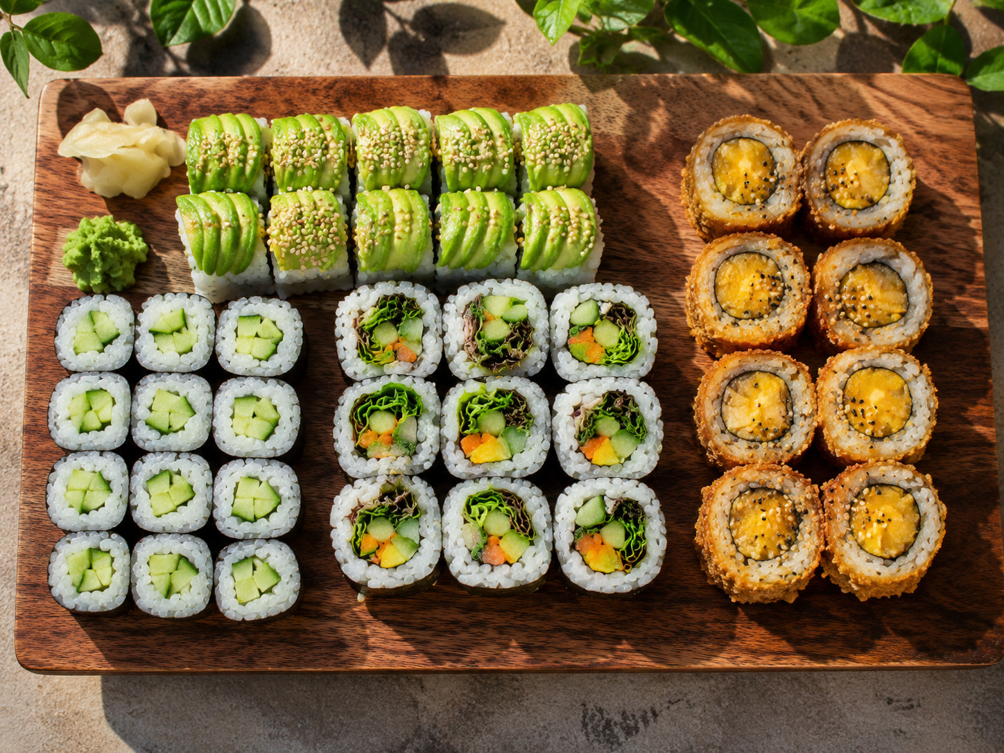 Japanese sushi platter with California, tuna, and salmon rolls